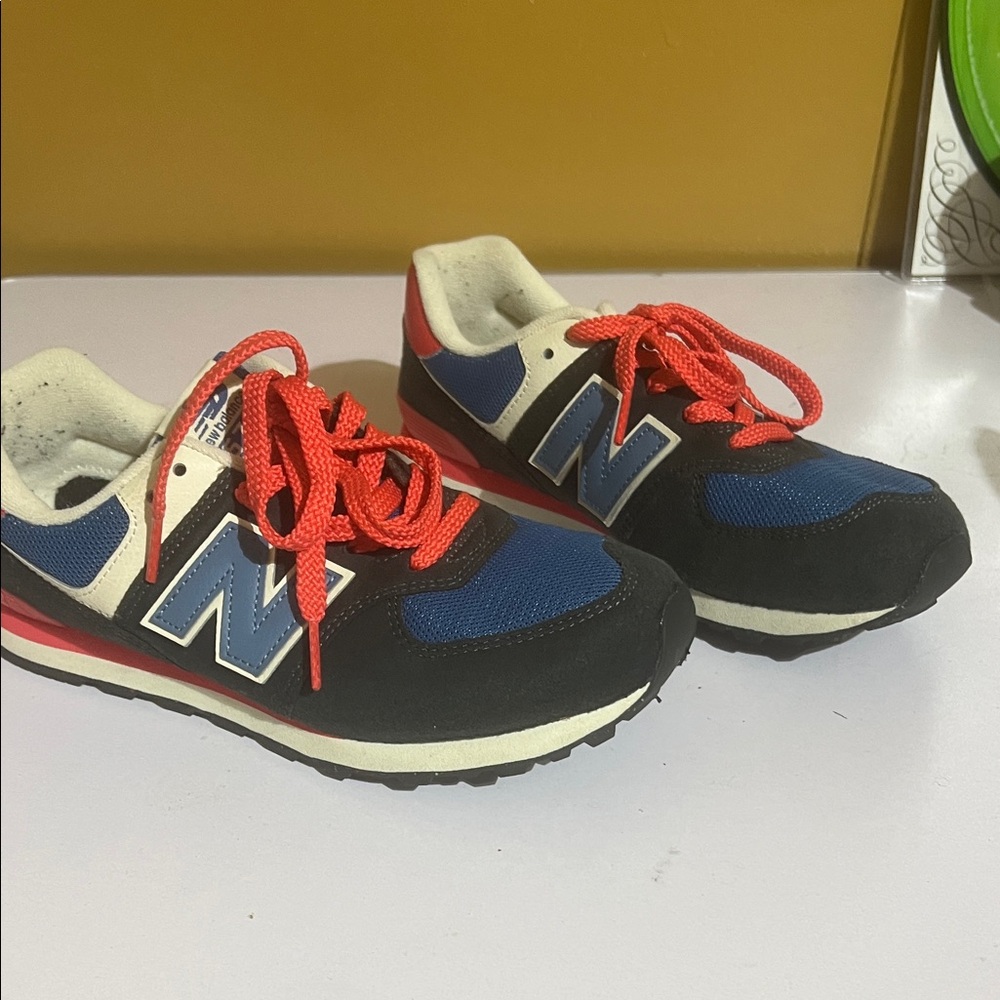 New Balance Kids Sneakers in Blue and Black with Red Accents